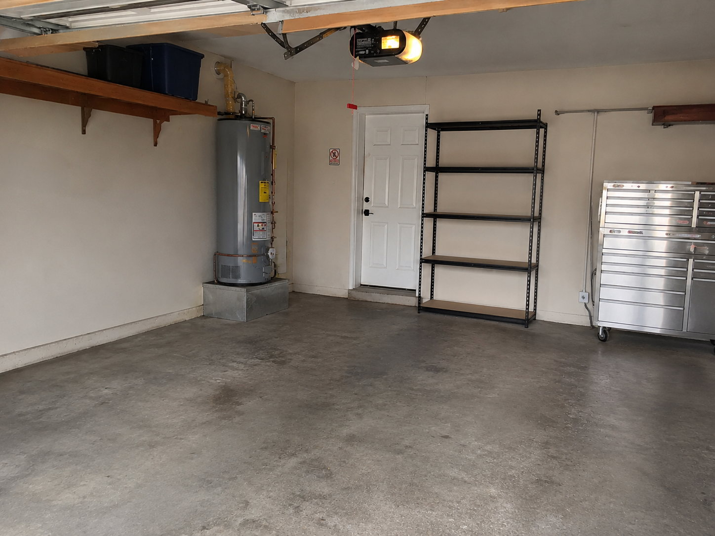 The same garage cleared, swept, and ready to use after the project